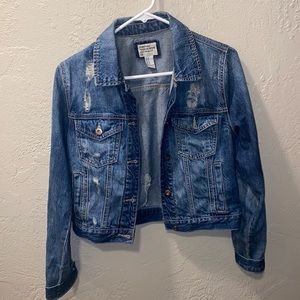 Distressed denim jacket
